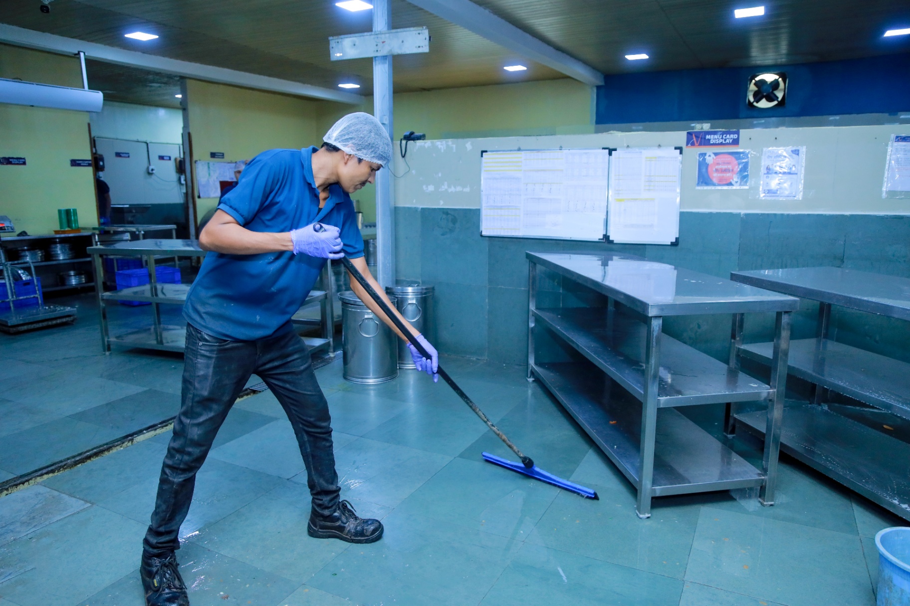 Weekly deep cleaning of kitchen